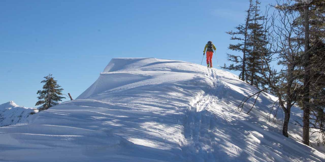 Skibergsteiger am Gipfel